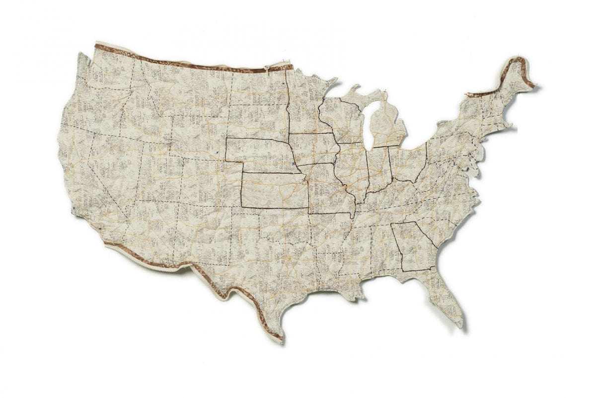 Map of the USA made of grey fabric.