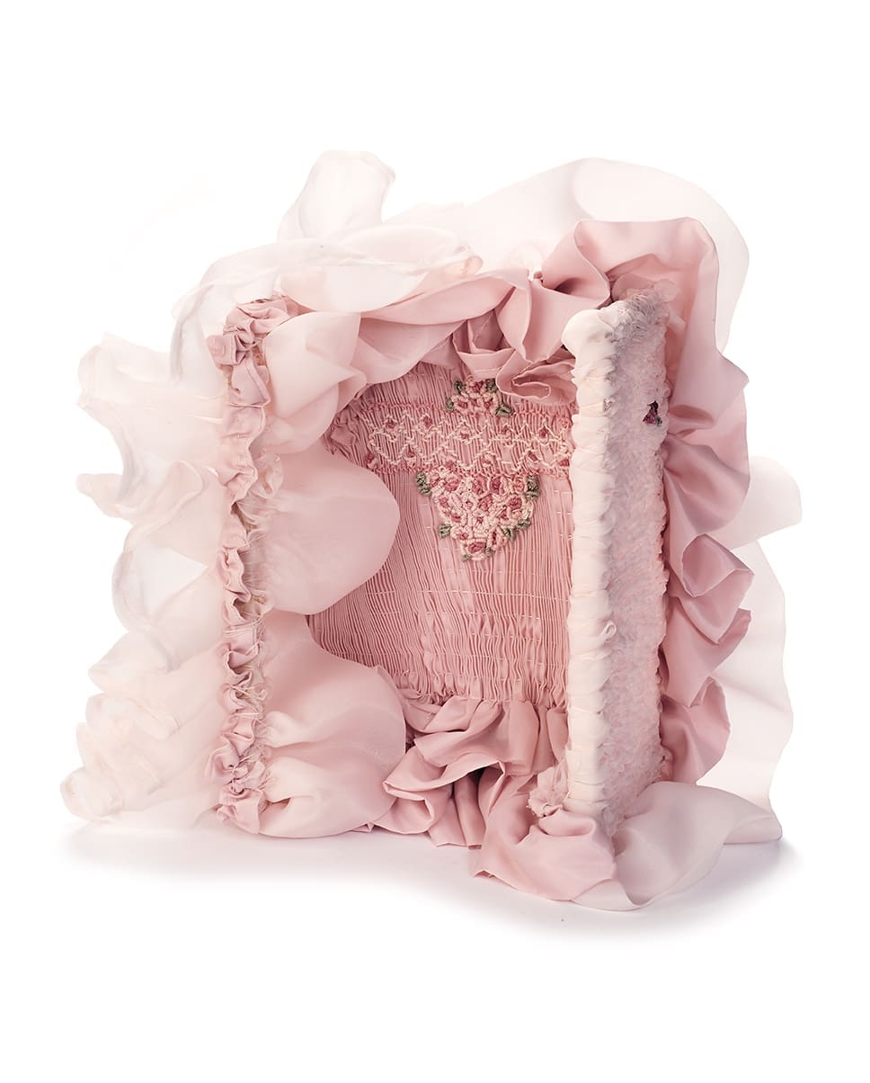 a pink fiber art piece