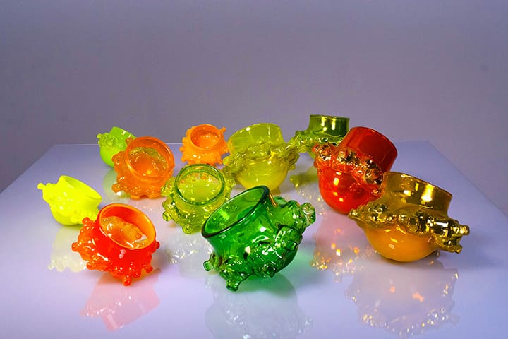 multicolored small glass bowls