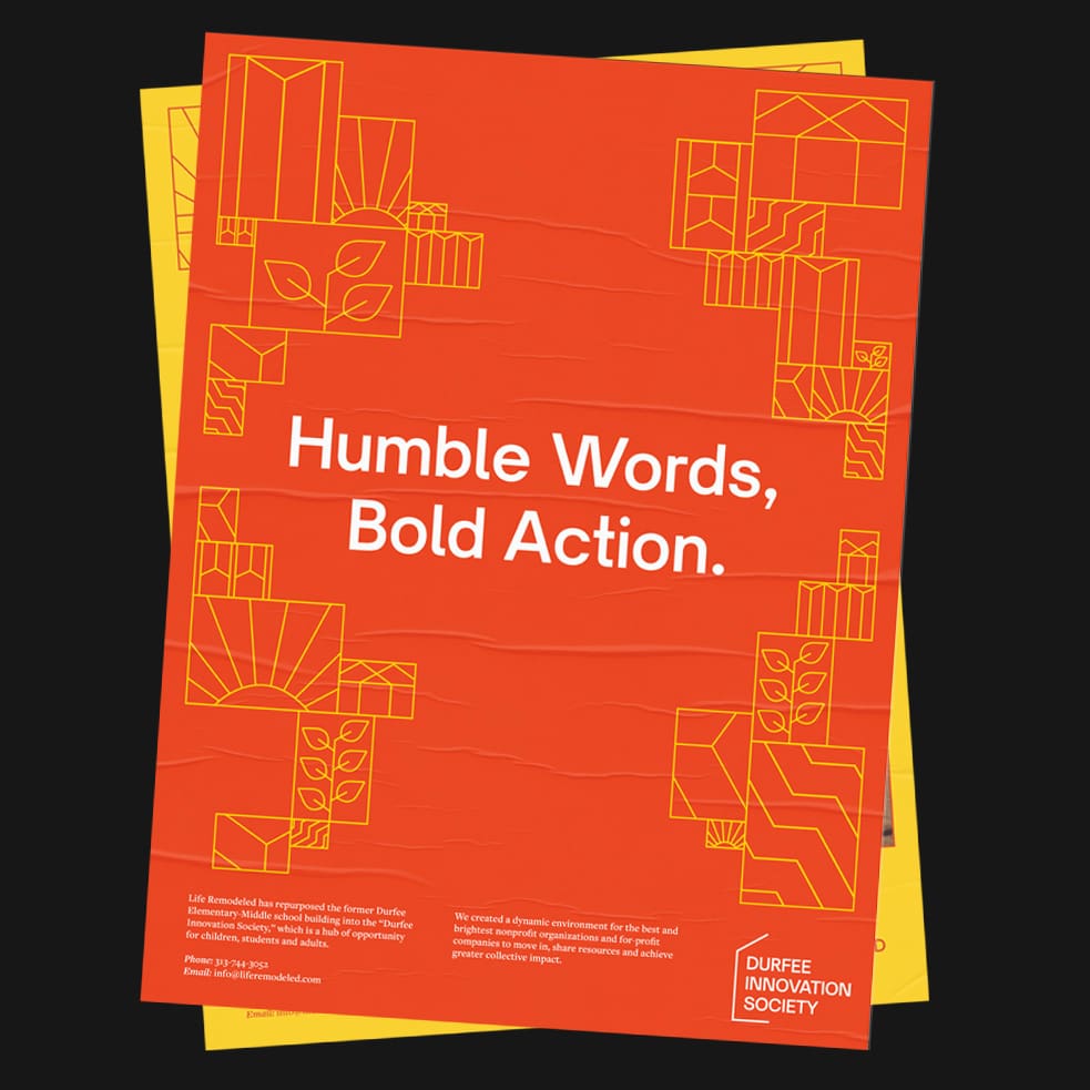 Rebranding for Life Remodeled. Shows an orange poster on top of a yellow poster against a black background. In the center of the orange poster is the bold white text "Humble Words, Bold Action" surrounded by yellow abstract geometric shapes that resemble housing units.