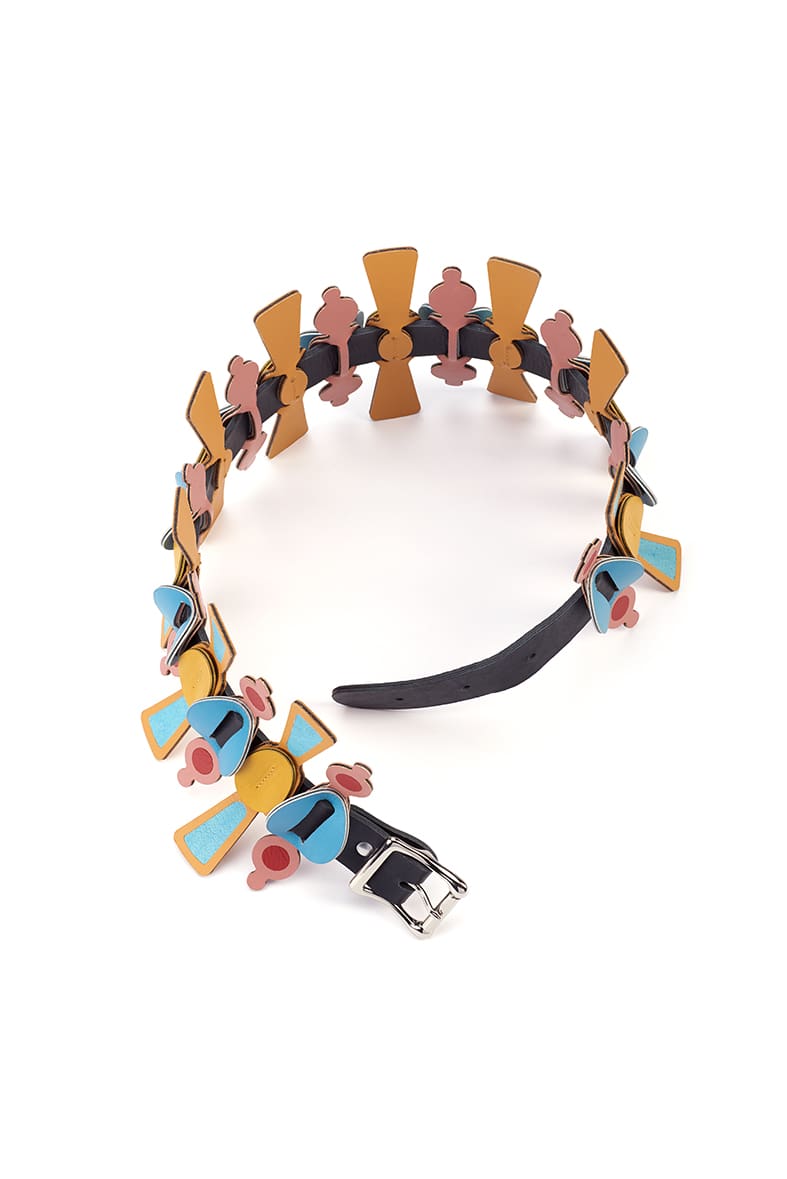 blue, pink, black and yellow laser cut leather belt