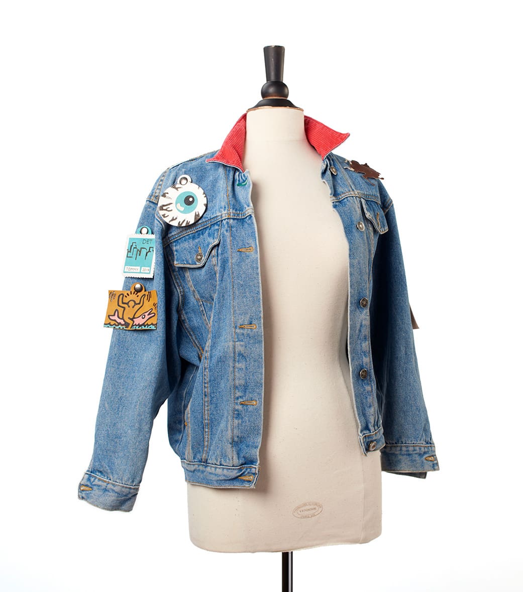Denim jacket with leather patches
